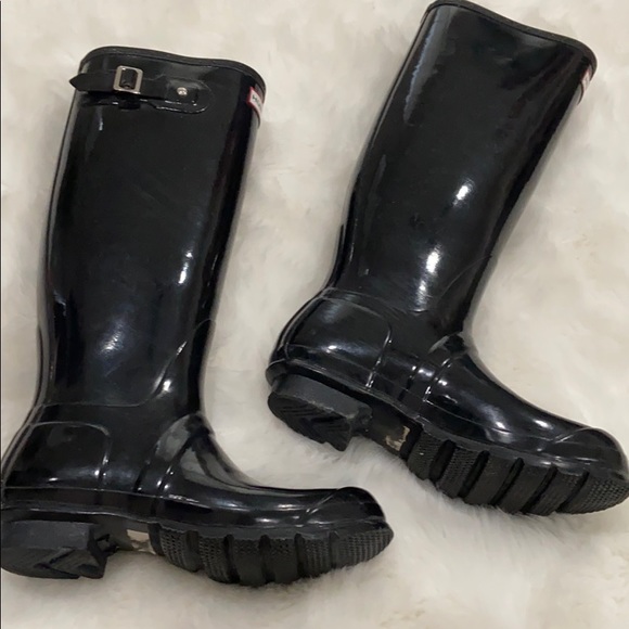 black shiny rain boots